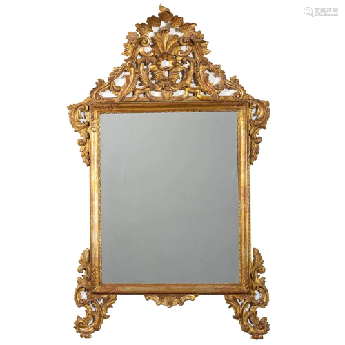 A Carved and Pierced Giltwood Mirror