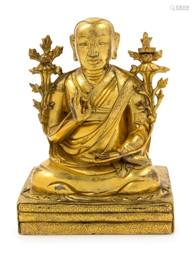 A Sino-Tibetan Gilt Bronze Figure Êof a Monk …