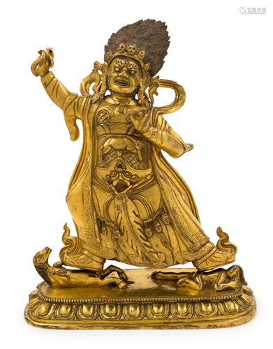 A Sino-Tibetan Gilt Bronze Figure of a Deity …