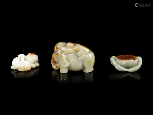 Three Chinese Jade Celadon and Russet Figure…