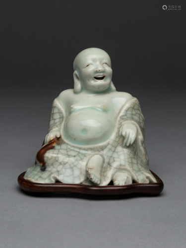 A Qingbai Glazed Porcelain Figure of Budhai…
