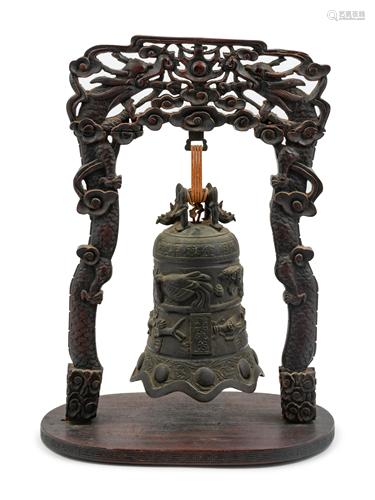 A Bronze Bell Height of bell 11 in., 28 cm.