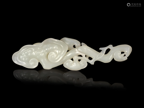 A Carved White Jade 'Lingzhi' Ruyi Scepter…