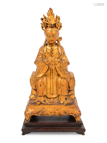 A Gilt Lacquered Bronze Figure of Guanyin …