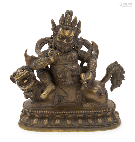 A Bronze Figure of a Deity on a Fu-Lion Heig…