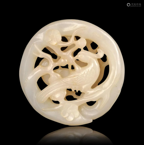 A Carved White Jade Pendant Diam. 2 1/4…