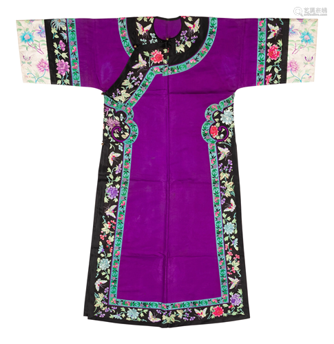 A Purple Ground Embroidered Silk Manchu …