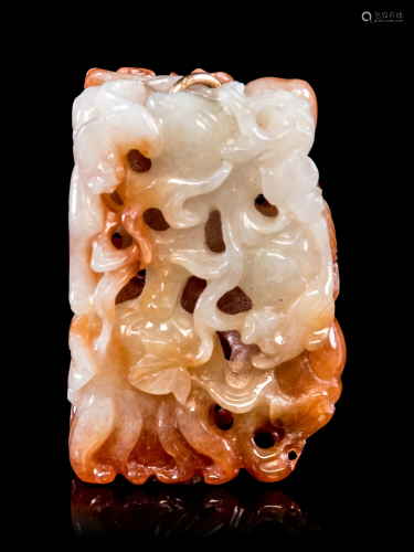 A Chinese Russet Jadeite Reticulated Pendant…