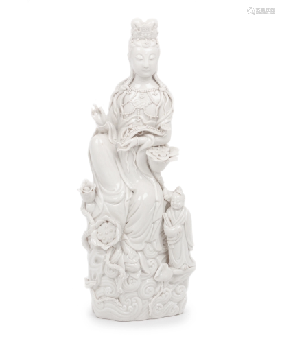 A Blanc-de-Chine Porcelain Figure of Guany…