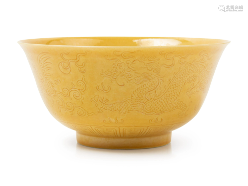 An Incised Yellow Glazed Porcelain 'Dragon …