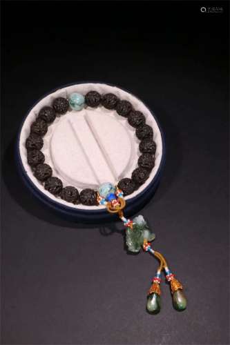 A Chinese Carved Agar-Wood Bracelet