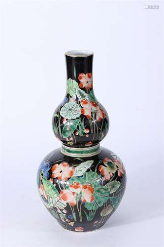 A Chinese Black Ground Famille-Rose Porcelain Double Gourd Vase