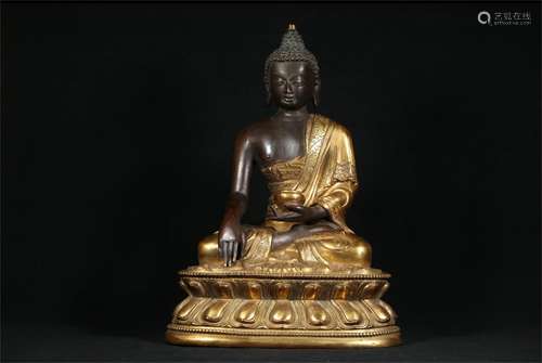 A Chinese Gilt Bronze Figure of Buddha