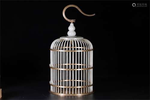 A Chinese Carved Jade Cage