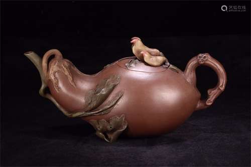 A Chinese Carved Yixing Clay Teapot