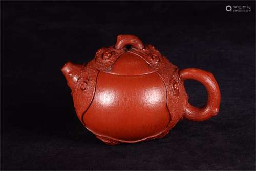 A Chinese Carved Yixing Clay Teapot