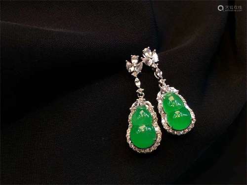 A Pair of Chinese Carved Jadeite Earrings