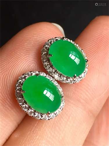 A Pair of Chinese Carved Jadeite Earrings