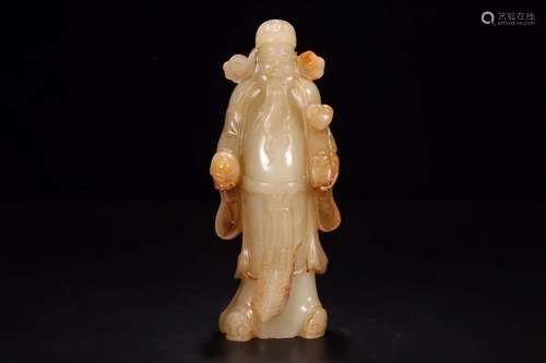 A HETIAN JADE FIGURE