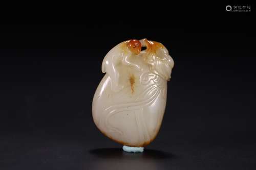 A HETIAN JADE ORNAMENT