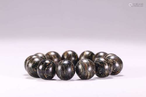 A CHENXIANG WOOD BRACELET