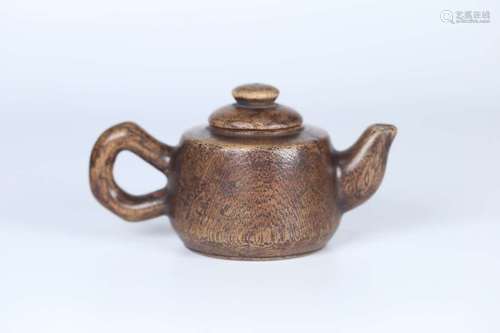 A QING DYNASTY CHENXIANG WOOD TEAPOT ORNAMENT