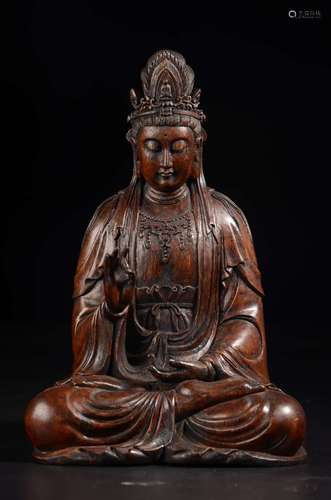 A CHENXIANG WOOD SITTING GUANYIN ORNAMENT