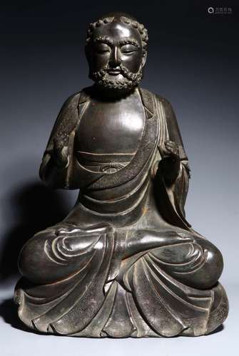 A QING DYNASTY COPPER BODHIDHARMA