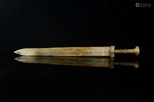 A HETIAN JADE SWORD SHAPED ORNAMENT