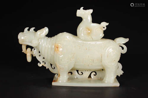 A HETIAN JADE BULL SHAPED ORNAMENT