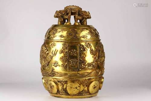 A QING DYNASTY GILT BRONZE ORNAMENT