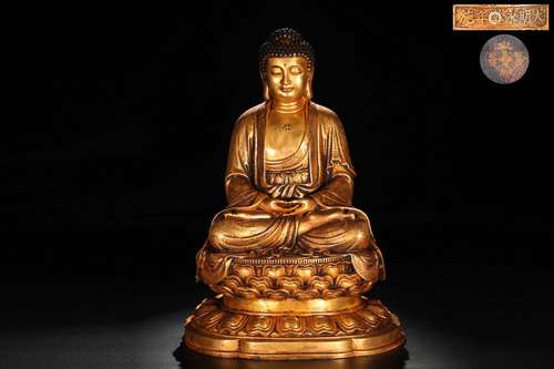 A DAMING YONGLE GILT BRONZE SITTING BUDDHA