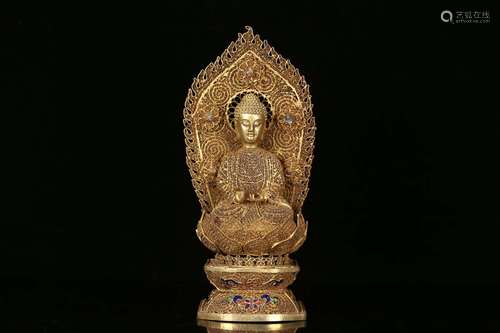 A GILT SILVER BUDDHA