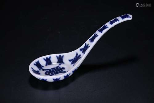 A BLUE AND WHITE SPOON