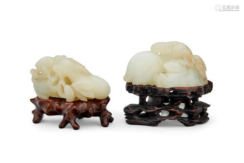 Two pale-celadon 'rams and ruyi' jade pebbles  Qing dynasty