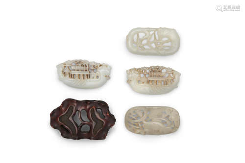A group of four jade plaques  Qing dynasty