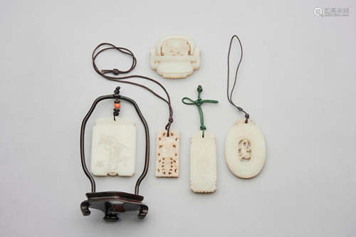 A group of five white jade carvings  19th century and later