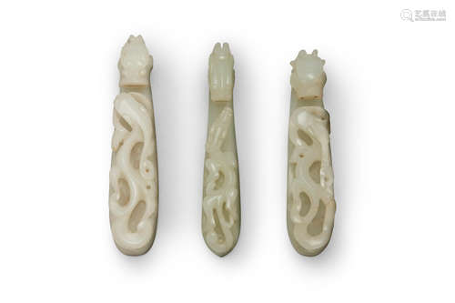 A group of three 'chi dragon' jade belt buckles  Qing dynasty