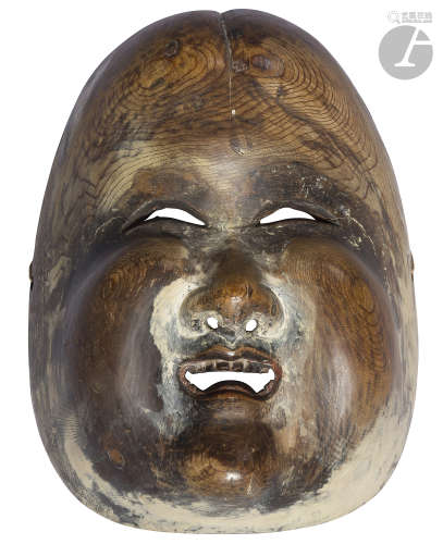 JAPON - XIXe siècle Masque d'Okame en bois de cyprès dit 