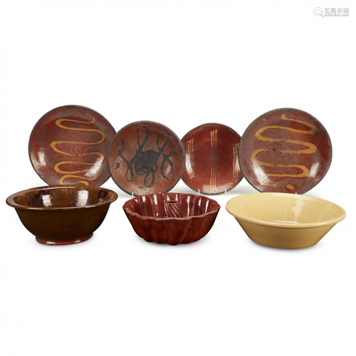 Group of six slip-decorated redware and r…