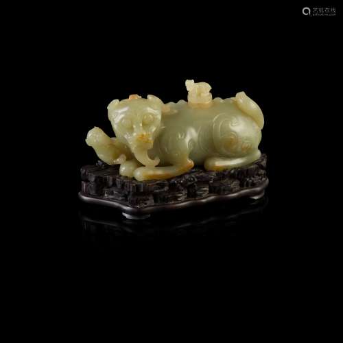 CELADON JADE 'QILING WITH CUBS' WATER DROPPER                         REPUBLIC PERIOD, 20TH CENTURY