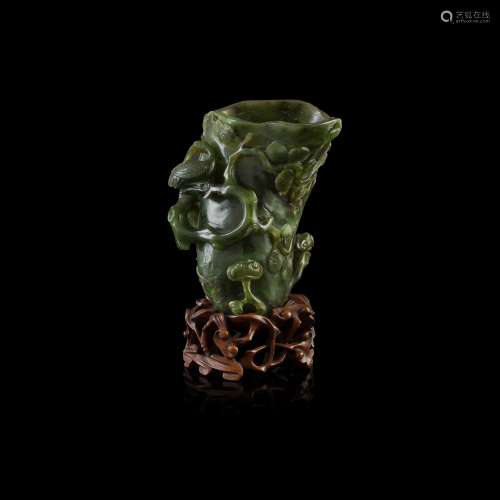SPINACH-GREEN JADE 'CRANE AND PINE TREE' VASE                         QING DYNASTY, 19TH CENTURY