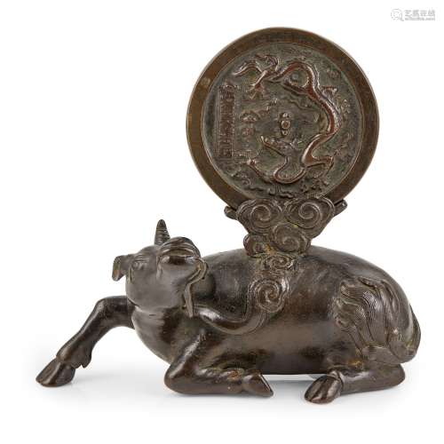 BRONZE MIRROR AND 'RHINOCEROS' STAND                         MING DYNASTY