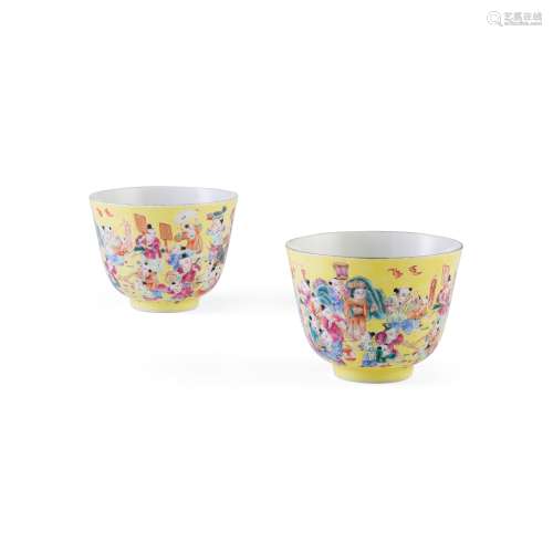 PAIR OF FAMILLE ROSE YELLOW-GROUND 'BOYS AT PLAY' CUPS