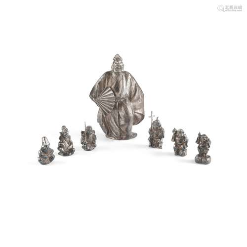 GROUP OF SEVEN JAPANESE SILVER 'FUKUJIN DEITIES' OKIMONO