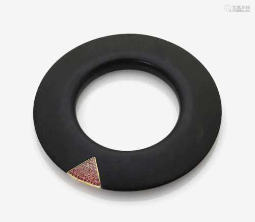 An Ebony Bangle with Pink Sapphires