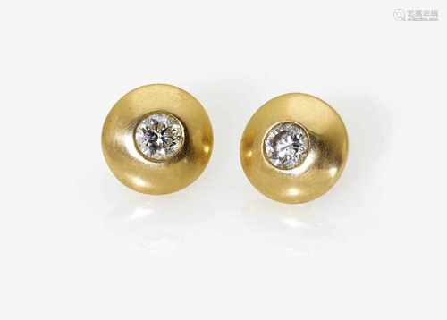 A Pair of Diamond Earrings