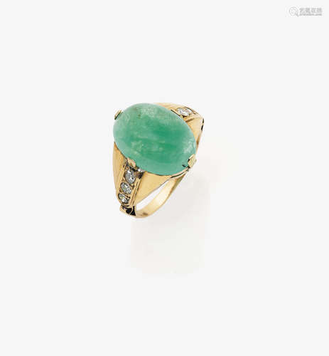 An Emerald and Diamond Ring