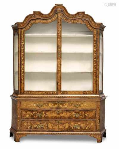 A commode with display cabinet