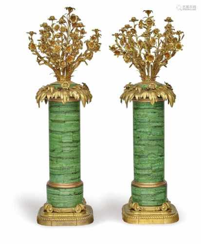 A pair of large 13-light candlesticks